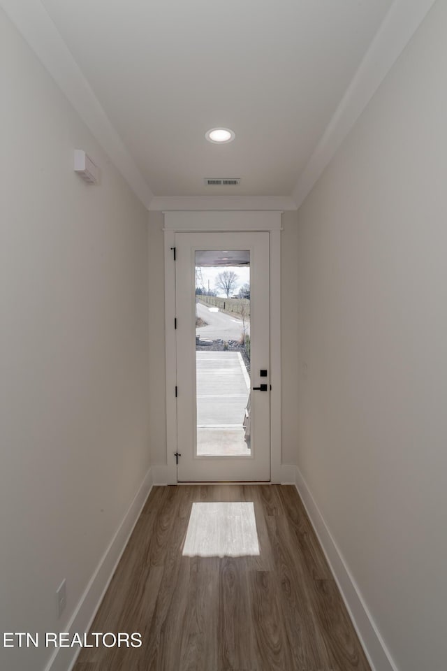 entryway with dark hardwood / wood-style floors