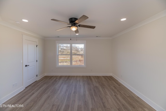 unfurnished room with ceiling fan, ornamental molding, and hardwood / wood-style floors