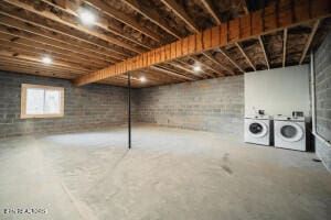 basement featuring washing machine and dryer