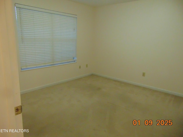 view of carpeted spare room