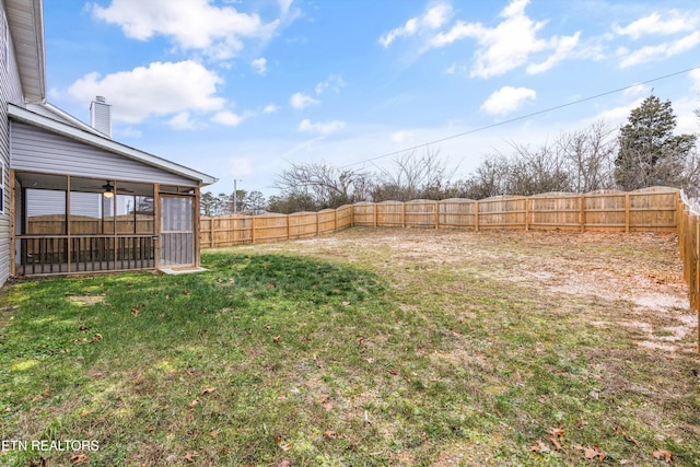 view of yard with a sunroom