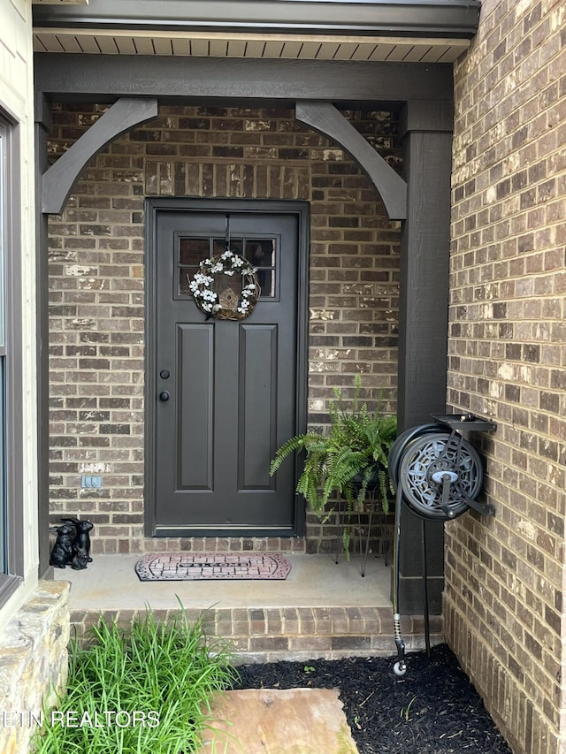 227 Starboard Dr, Lenoir City, TN 37772 - doorway to property featuring brick siding