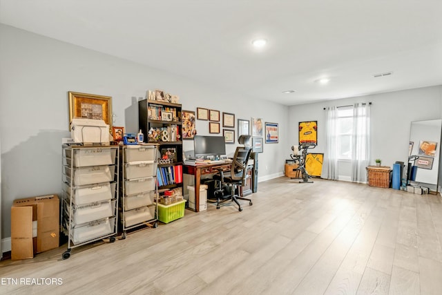 office space featuring light hardwood / wood-style floors