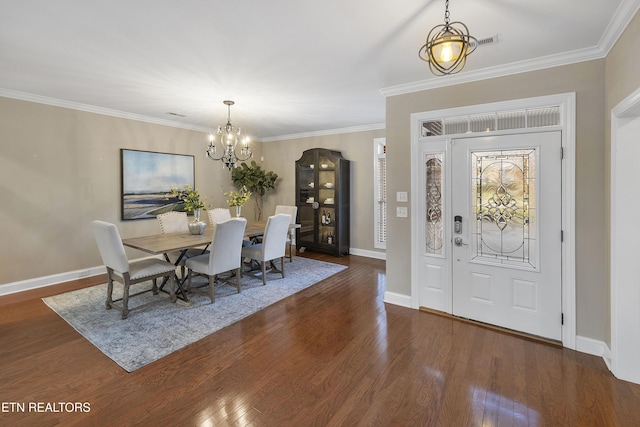 interior space with crown molding, dark hardwood / wood-style floors, and a notable chandelier