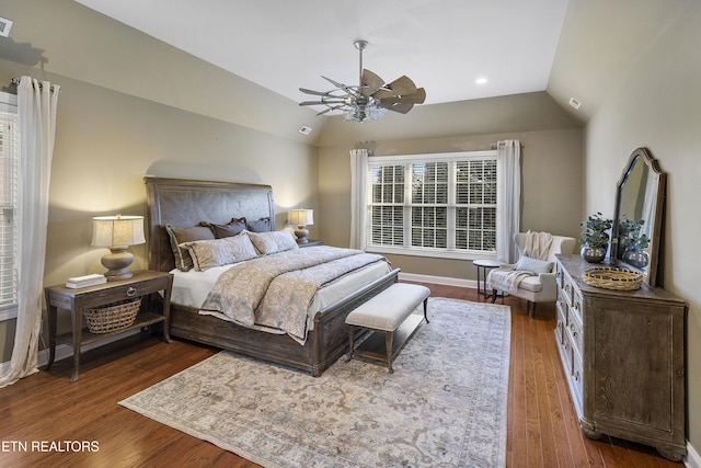 bedroom featuring ceiling fan, lofted ceiling, and hardwood / wood-style flooring