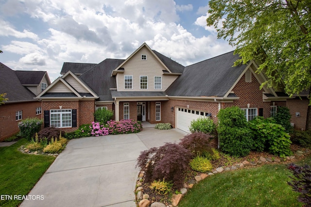12738 Edgebrook Way, Knoxville, TN 37922 - view of front facade featuring brick siding, concrete driveway, an attached garage, and covered porch