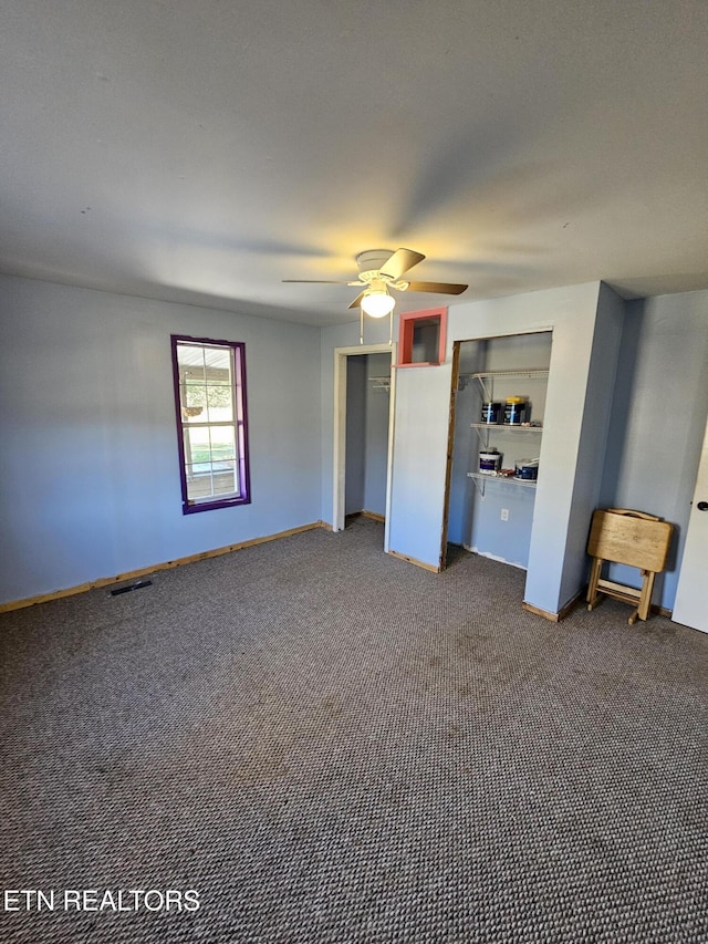 unfurnished bedroom with carpet and ceiling fan