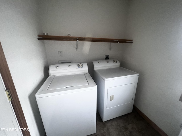 washroom featuring washer and dryer