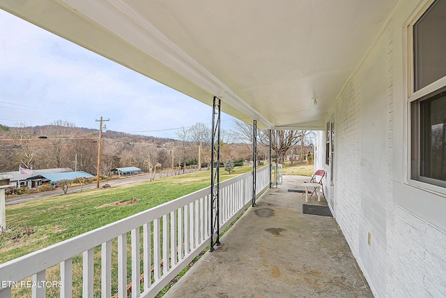 view of patio featuring a porch