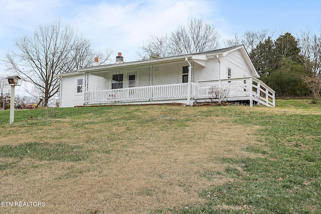 view of front of home with a front yard