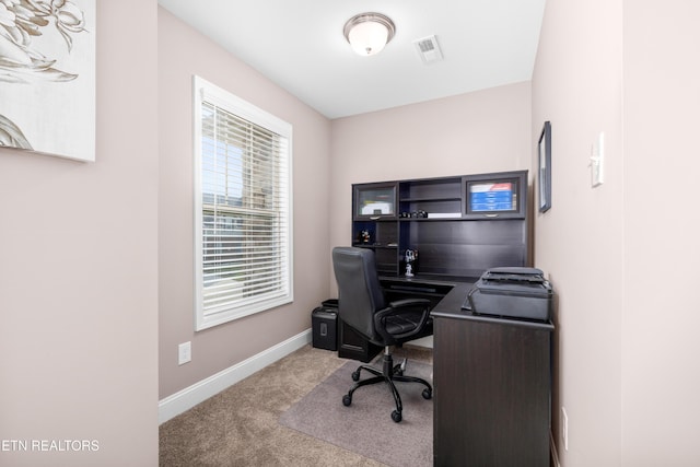 view of carpeted office space