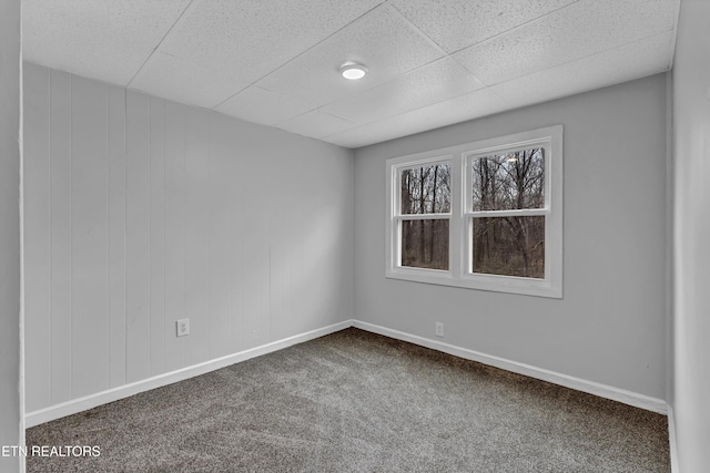 unfurnished room featuring carpet flooring