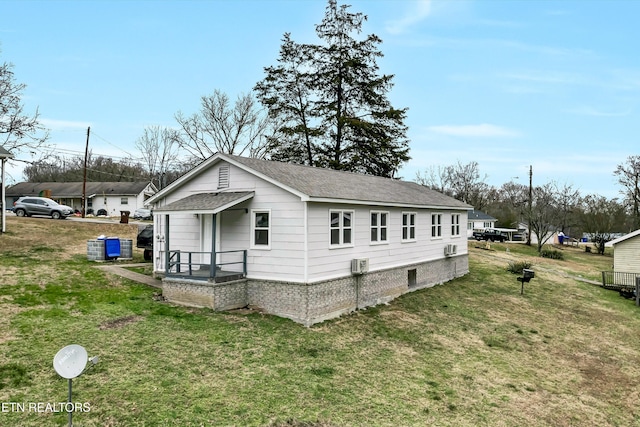 view of home's exterior featuring a lawn