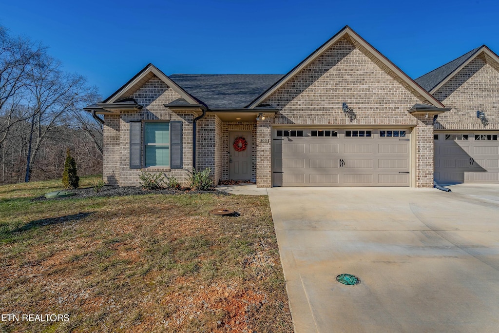 view of front of home with a garage