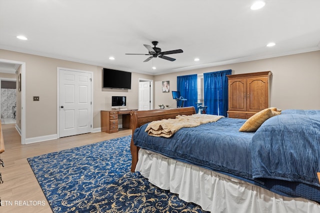 bedroom featuring ceiling fan, light hardwood / wood-style flooring, and crown molding