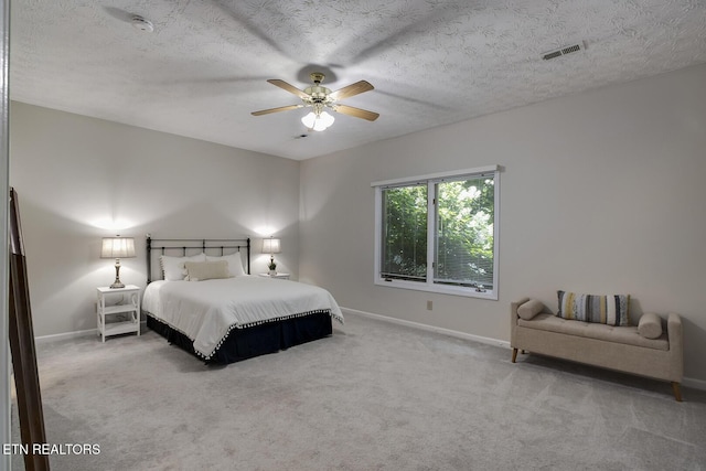 122 Oohleeno Way, Loudon, TN 37774 - carpeted bedroom with a ceiling fan and a textured ceiling