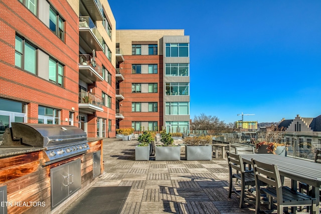 view of patio with a grill and area for grilling