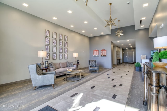 living room with an inviting chandelier