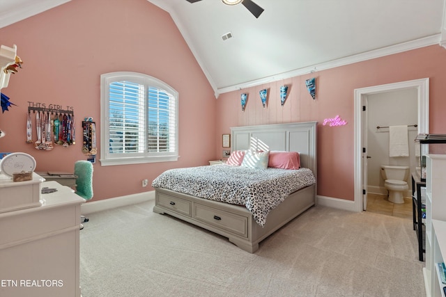 bedroom featuring connected bathroom, ceiling fan, high vaulted ceiling, crown molding, and light colored carpet