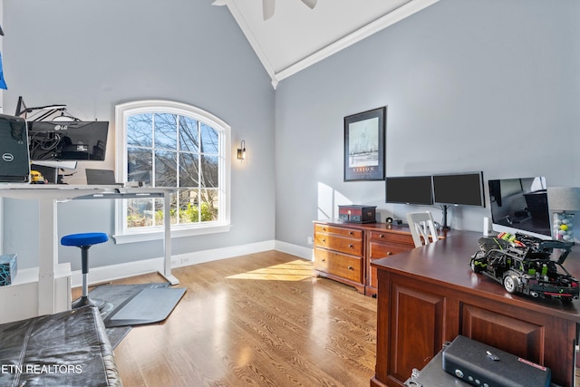 office area featuring high vaulted ceiling, ceiling fan, crown molding, and light hardwood / wood-style flooring