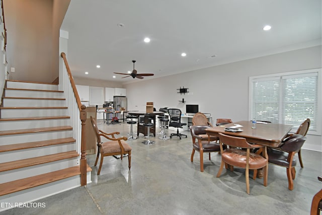 dining space featuring ceiling fan