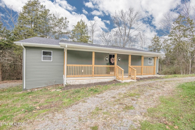 ranch-style home with covered porch