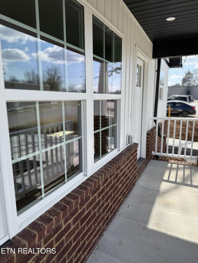 balcony featuring a sunroom