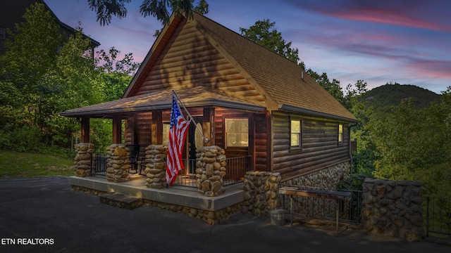 log-style house with a mountain view