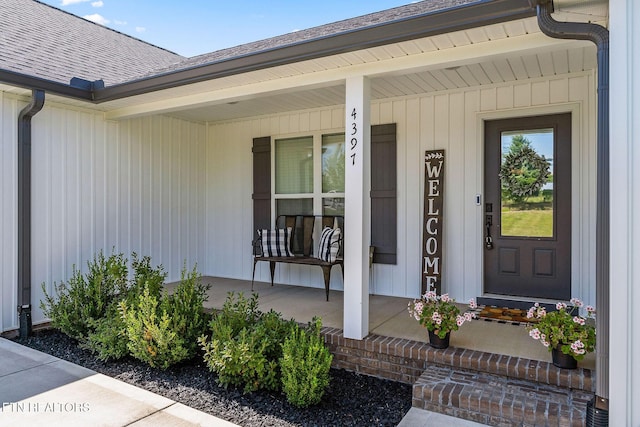 property entrance with covered porch