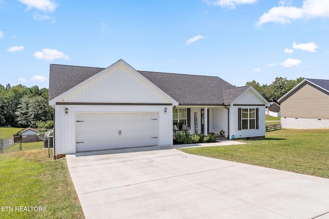 ranch-style house with a front yard and a garage