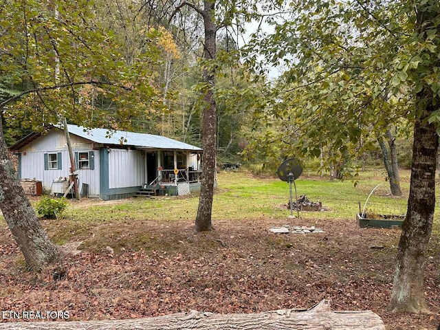 view of yard with a porch