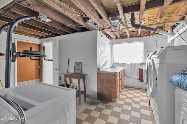 laundry area with washer and dryer