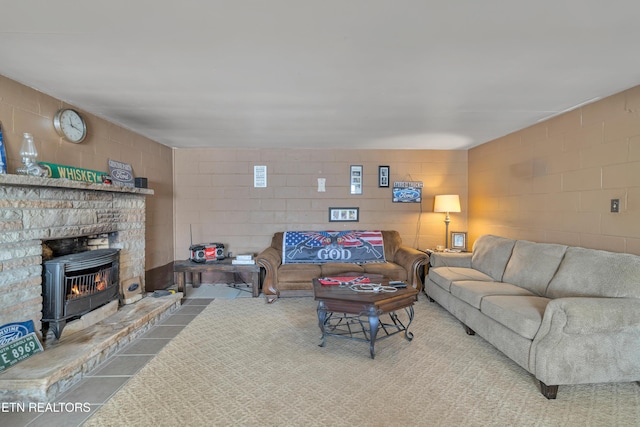 living room featuring a wood stove