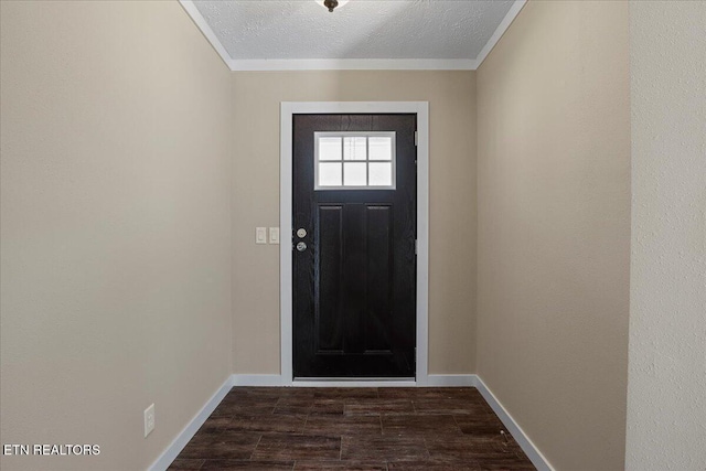 entryway featuring a textured ceiling and dark wood-type flooring