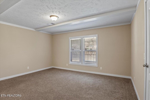 carpeted empty room with a textured ceiling