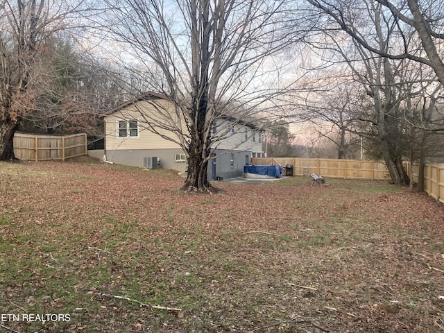 view of yard featuring central AC