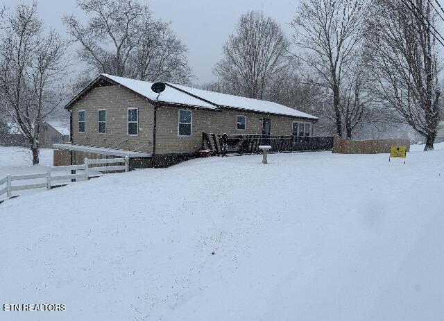 view of snow covered property