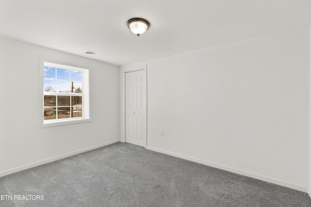 view of carpeted spare room