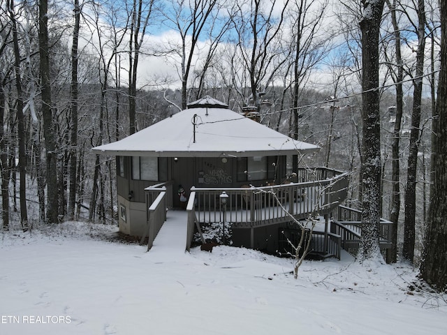 view of front of property with a deck