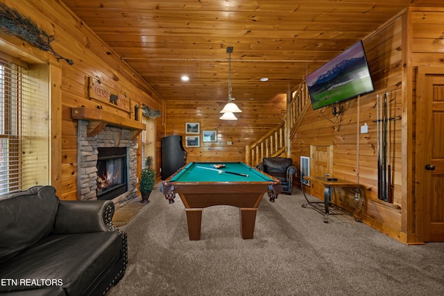 rec room featuring carpet flooring, a stone fireplace, wooden ceiling, and billiards