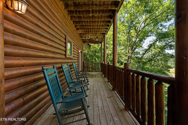 wooden deck featuring a porch