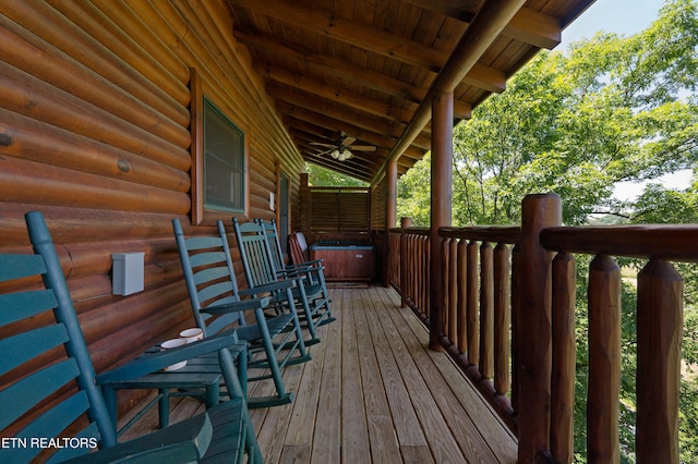 deck featuring a porch and ceiling fan