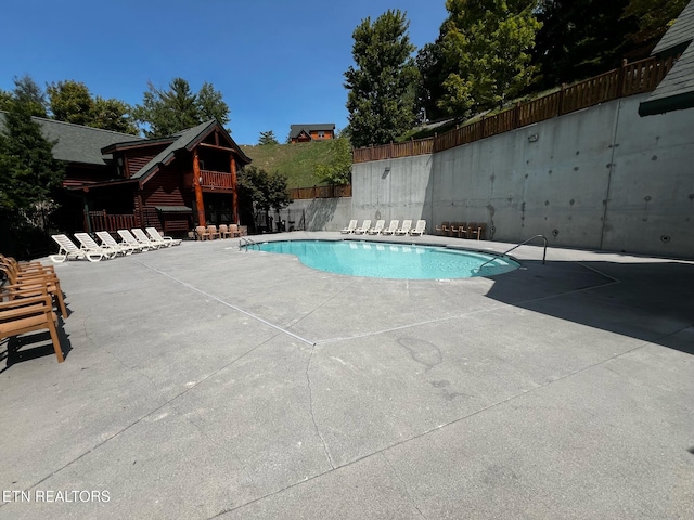 view of pool with a patio