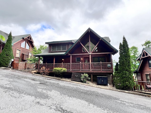 1726 Summit View Way, Pigeon Forge, TN 37862 - cabin with a porch and log exterior