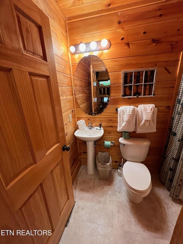 1726 Summit View Way, Pigeon Forge, TN 37862 - full bath with toilet, wood walls, and tile patterned floors