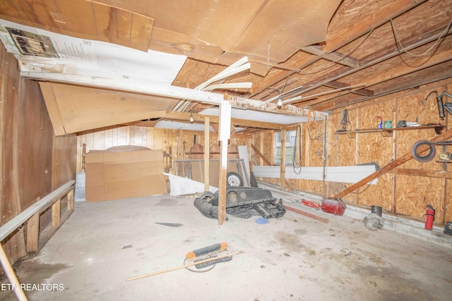 basement with wood walls