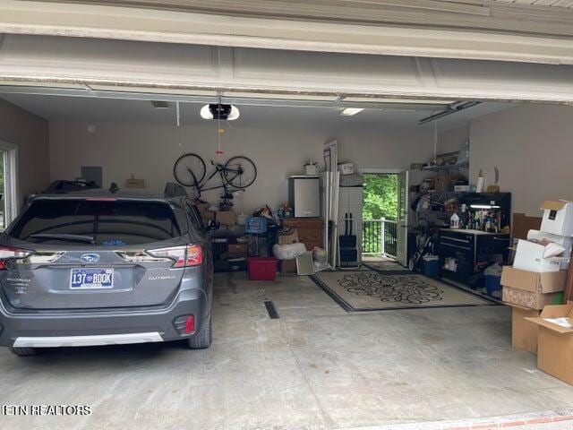 garage featuring a garage door opener