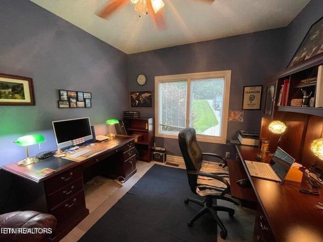 office area with a ceiling fan and lofted ceiling