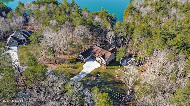 bird's eye view featuring a forest view