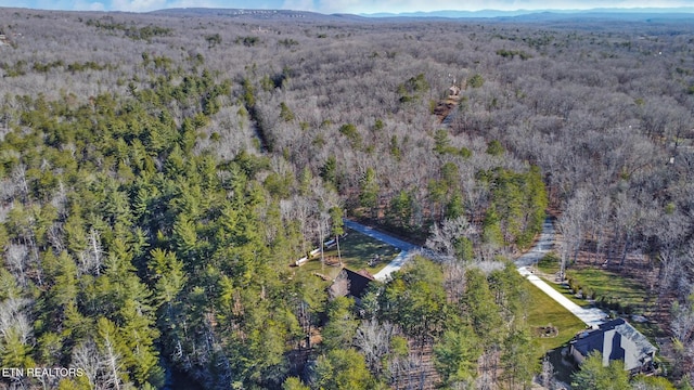 bird's eye view featuring a view of trees